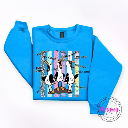 Sapphire colored heavyweight crewneck with a personalized teacher seagull design.