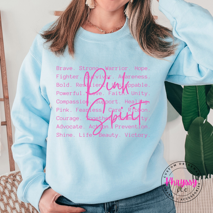 Light Blue crewneck sweatshirt with the brave strong warrior Pink Spirit graphic in pink
