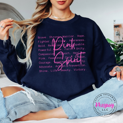 Navy crewneck sweatshirt with the Pink Spirit strength word design in white