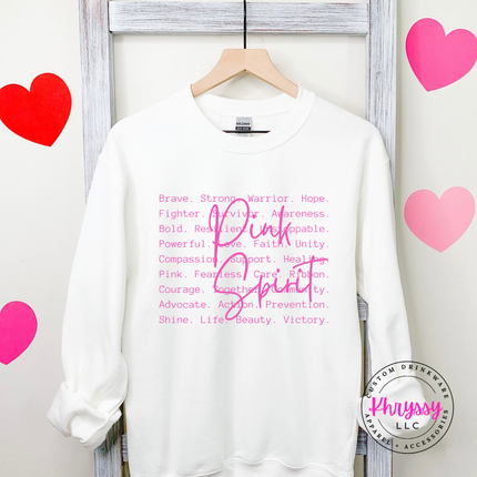 White crewneck sweatshirt with the Pink Spirit survivor word art in pink
