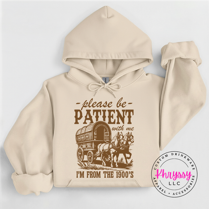 Substantial vintage humor pullover hoodie with charming covered wagon illustration