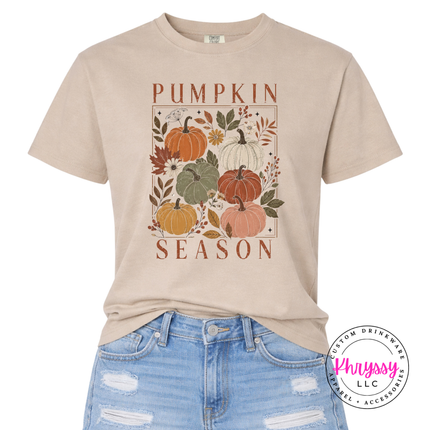 Sandstone tee with a blush and rust floral pumpkin illustration, perfect for fall.