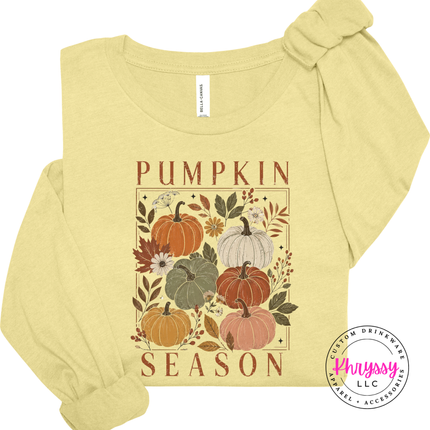 Heather french vanilla colored top with a blush pumpkin season graphic across the chest.