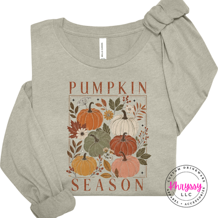 heather stone top with a muted rust and sage pumpkin illustration.