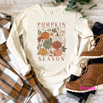 Ivory tee styled with jeans, featuring a floral pumpkin block print.