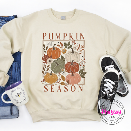 Sand crewneck sweatshirt styled for fall, featuring a pumpkin block design.