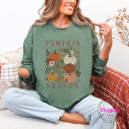 Sport Green colored crewneck sweatshirt with a hand-illustrated floral pumpkin print.