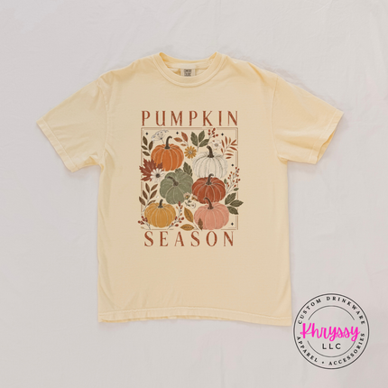 Butter yellow graphic tee with a blush floral pumpkin design.