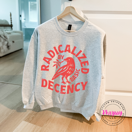 Heavyweight bold statement crewneck with red raven radicalized by basic decency graphic