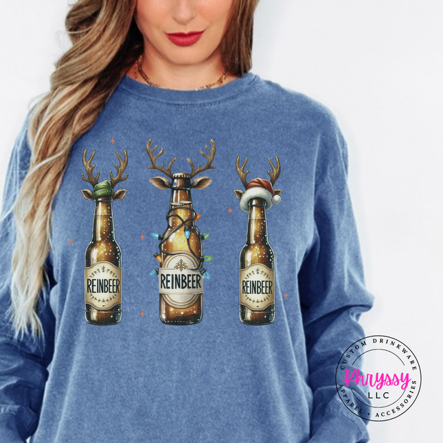 Blue Jean long sleeve tee featuring three reindeer beer bottles with Reinbeer labels.