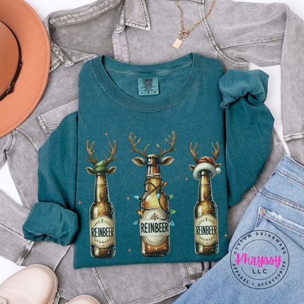 Model wearing the Reinbeer reindeer beer long sleeve tee in Blue Spruce.