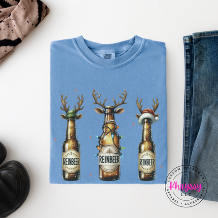Washed Denim long sleeve tee showing antlered beer bottles with twinkle lights.