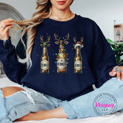 Close up of the Reinbeer reindeer beer art on a Navy crewneck sweatshirt.