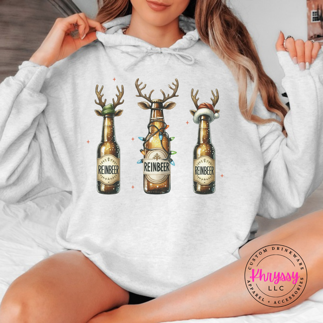 Ash hoodie featuring three reindeer beer bottles with Reinbeer labels.