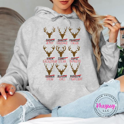 Ash hoodie featuring crossed out reindeer names and dinner puns.