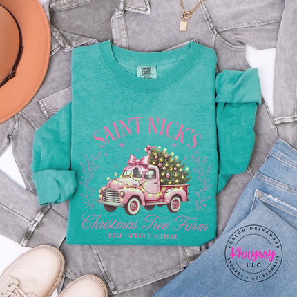Close up of the Saint Nick's tree farm art on a Seafoam long sleeve tee.