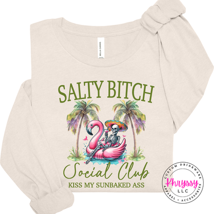 Natural shirt showing a funny salty beach social club graphic.