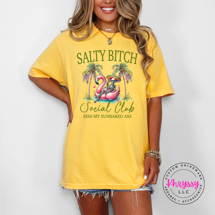 Citrus yellow beach tee featuring a flamingo float skeleton graphic.