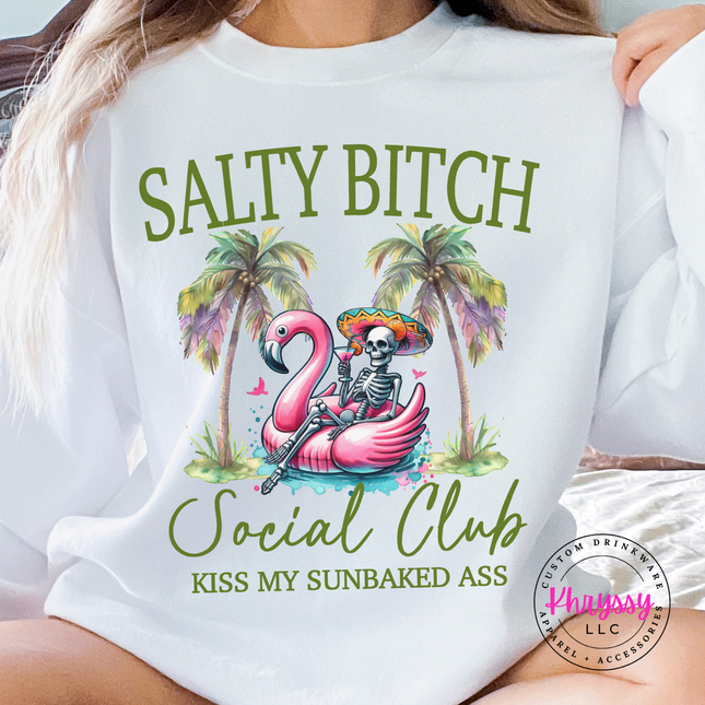 White crewneck with a flamingo float skeleton beach design.