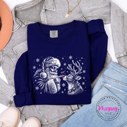 True Navy long sleeve tee featuring a grinning reindeer and Santa with snowflakes.