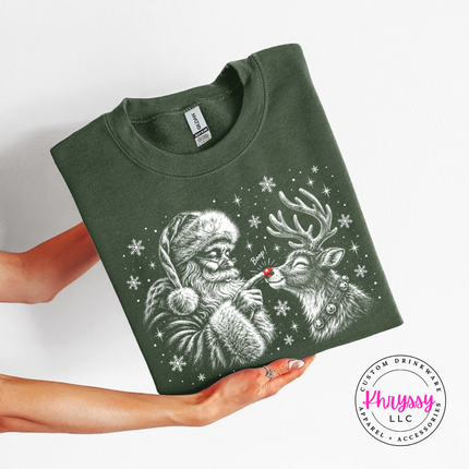 Military Green crewneck sweatshirt with Santa booping his reindeer on the nose.