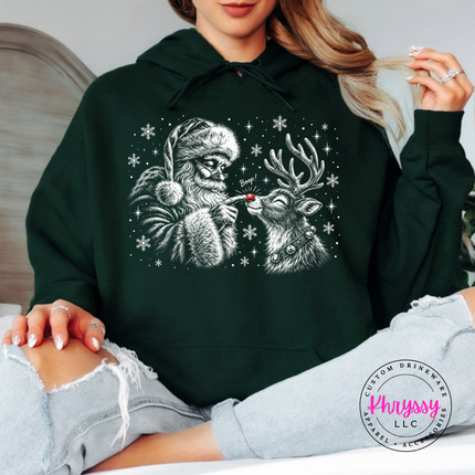 Woman wearing the Santa boop reindeer hoodie in Forest.
