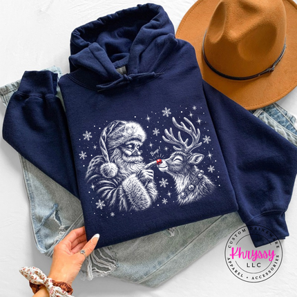 Navy hoodie with Santa booping his reindeer on the nose.