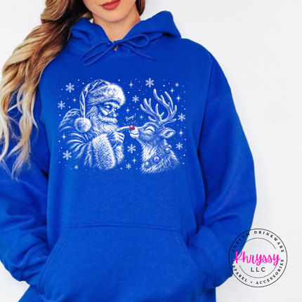 Woman wearing the Santa boop reindeer hoodie in Royal.