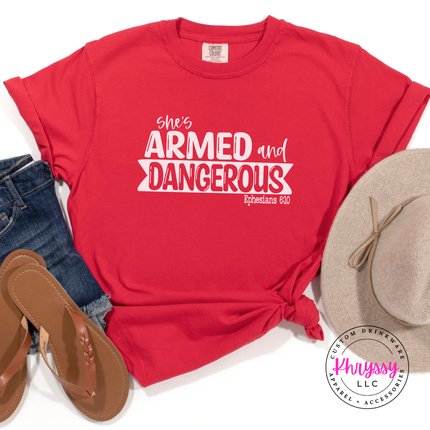 Red relaxed tee featuring a She's Armed and Dangerous scripture design.