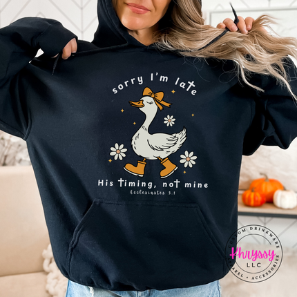 Black pullover hoodie with a white Sorry I'm Late goose faith graphic.