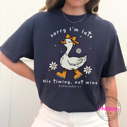 Navy garment-dyed tee with a white Sorry I'm Late His Timing goose print.