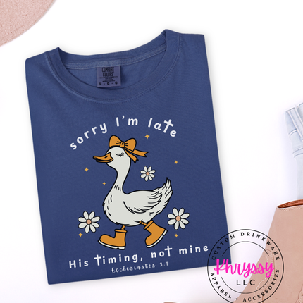 Blue t-shirt with a duck graphic and text on a white background