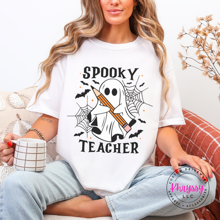 White graphic tee with a hand-illustrated spooky teacher Halloween print.