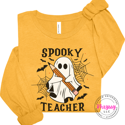 Heather mustard tee with a spooky teacher ghost design.