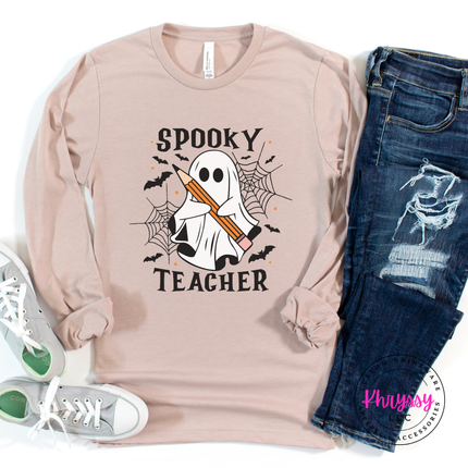 Heather pink gravel tee styled for fall, featuring a spooky teacher ghost design.