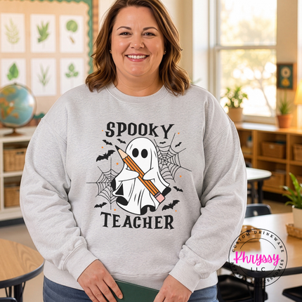 Ash crewneck sweatshirt with the Spooky Teacher ghost with pencil graphic