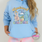 Light Blue pullover hoodie featuring a groovy pastel Sunkissed and Carefree design.