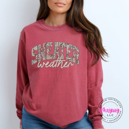 Brick long sleeve tee showing Sweater in camo leopard with weather script.