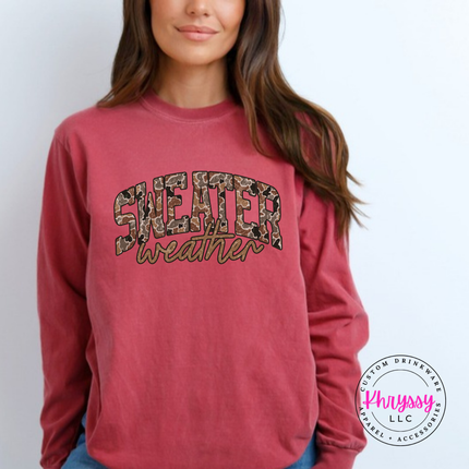 Flat lay of the Sweater Weather Christmas long sleeve tee in Crimson.