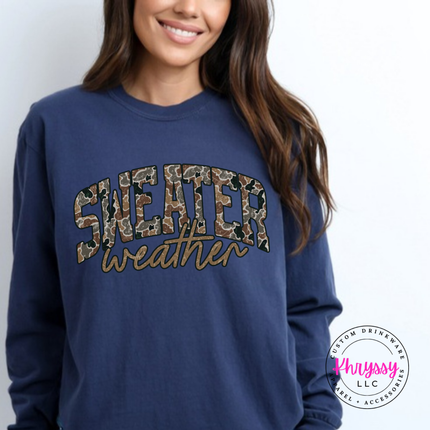 Flat lay of the Sweater Weather Christmas long sleeve tee in Midnight.
