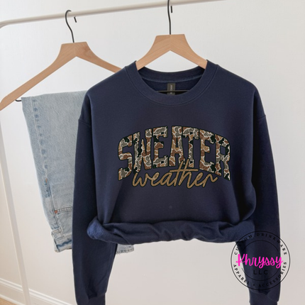 Model wearing the Sweater Weather crewneck sweatshirt in Navy.