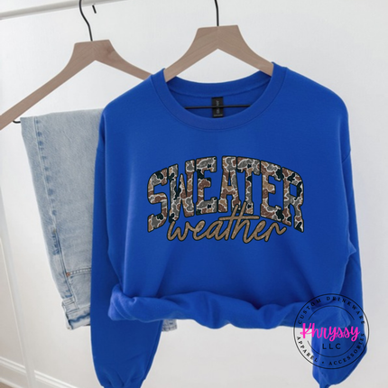 Flat lay of the Sweater Weather Christmas crewneck sweatshirt in Royal.