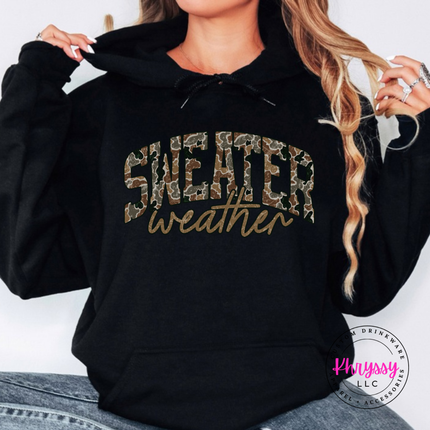Model wearing the Sweater Weather hoodie in Black.