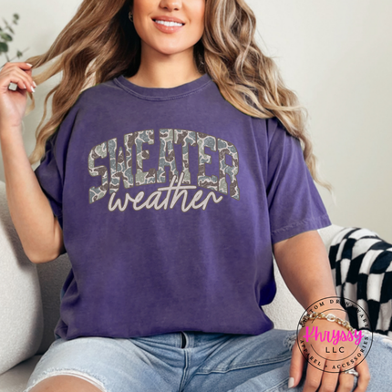 Model wearing the Sweater Weather tee in Grape.