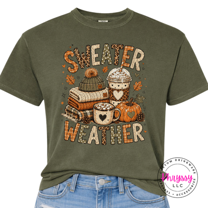 Sage tee printed with the sweater weather graphic in warm fall tones