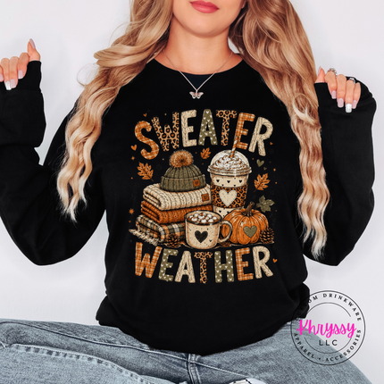 Black long sleeve tee featuring a sweater weather design with books and coffee
