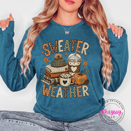 Heather Deep Teal long sleeve tee printed with a cozy sweater weather graphic