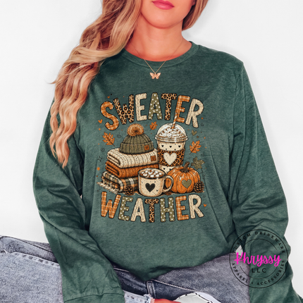 Woman wearing a Heather Forest long sleeve tee with the sweater weather fall design