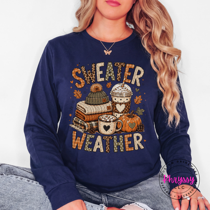 Navy long sleeve tee featuring the sweater weather design in warm fall tones