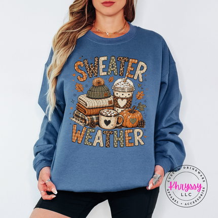 Indigo Blue crewneck sweatshirt on a hanger with the sweater weather fall design